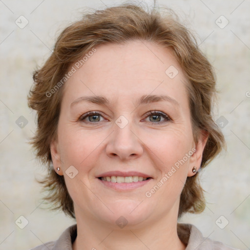 Joyful white young-adult female with medium  brown hair and blue eyes