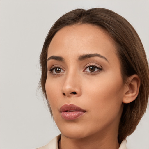 Neutral white young-adult female with medium  brown hair and brown eyes