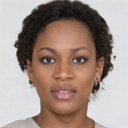 Neutral black young-adult female with short  brown hair and brown eyes