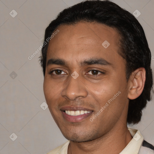 Joyful white young-adult male with short  black hair and brown eyes