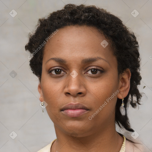 Neutral black young-adult female with short  brown hair and brown eyes