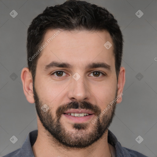 Joyful white young-adult male with short  black hair and brown eyes