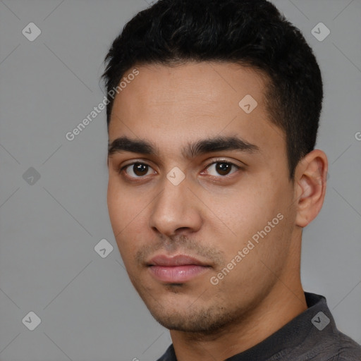 Neutral white young-adult male with short  black hair and brown eyes