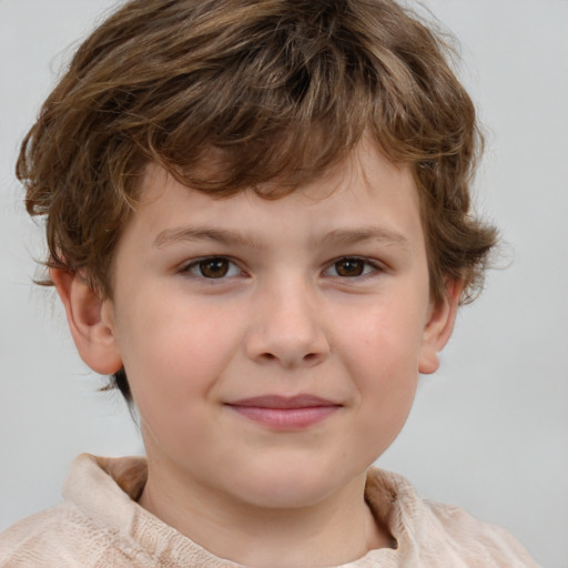 Joyful white child male with short  brown hair and brown eyes