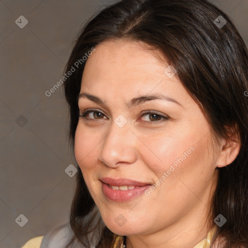 Joyful white adult female with medium  brown hair and brown eyes