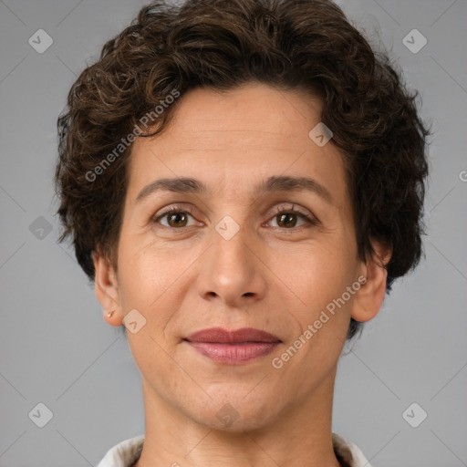 Joyful white adult female with short  brown hair and brown eyes