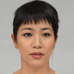 Neutral asian young-adult female with medium  brown hair and brown eyes