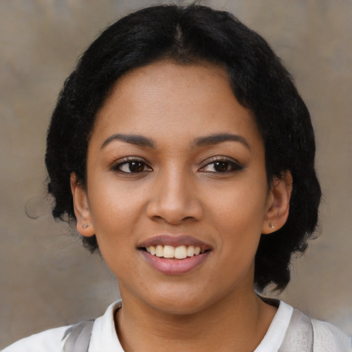 Joyful latino young-adult female with medium  black hair and brown eyes