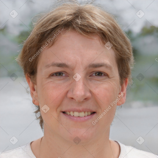 Joyful white adult female with short  brown hair and grey eyes