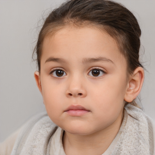 Neutral white child female with medium  brown hair and brown eyes