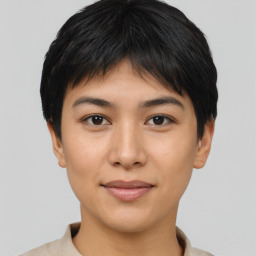 Joyful asian young-adult female with short  brown hair and brown eyes