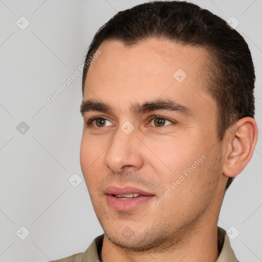 Joyful white young-adult male with short  brown hair and brown eyes