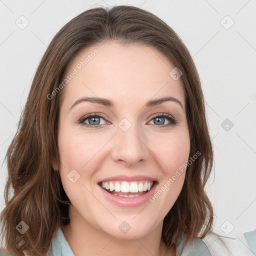 Joyful white young-adult female with medium  brown hair and green eyes