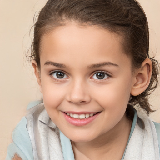 Joyful white child female with medium  brown hair and brown eyes