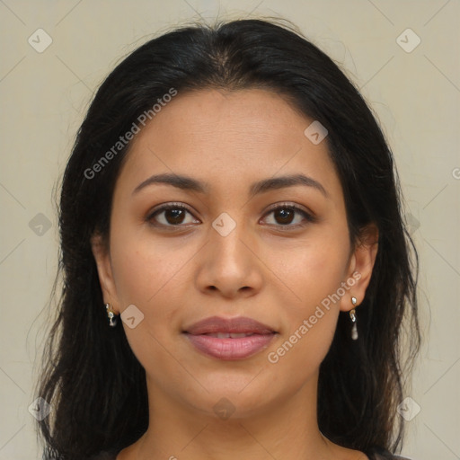 Joyful latino young-adult female with long  brown hair and brown eyes