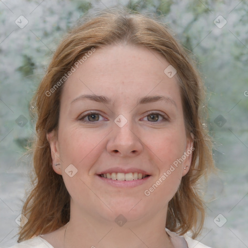 Joyful white young-adult female with medium  brown hair and blue eyes