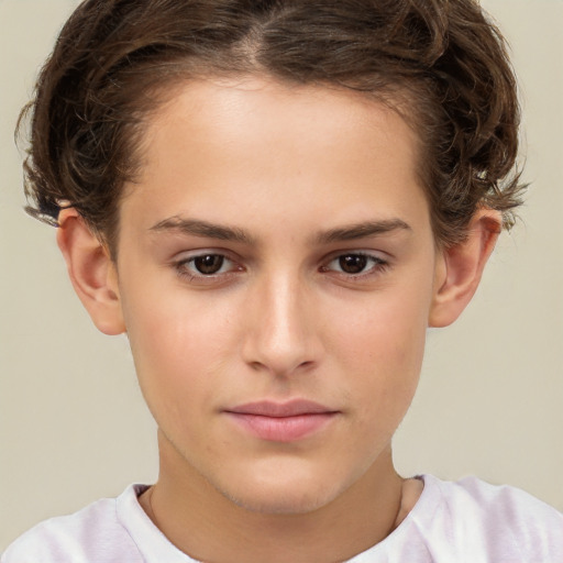 Joyful white child female with short  brown hair and brown eyes