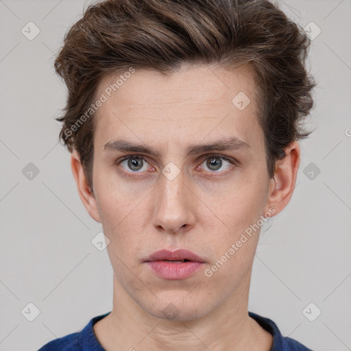 Neutral white young-adult male with short  brown hair and grey eyes