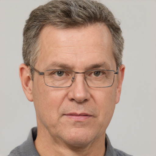 Neutral white middle-aged male with short  brown hair and grey eyes