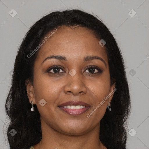 Joyful black young-adult female with long  brown hair and brown eyes