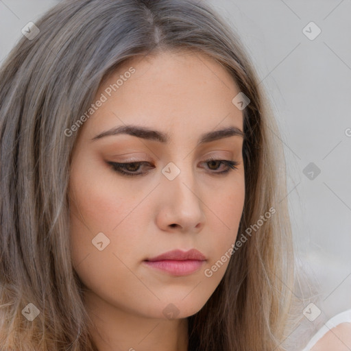 Neutral white young-adult female with long  brown hair and brown eyes