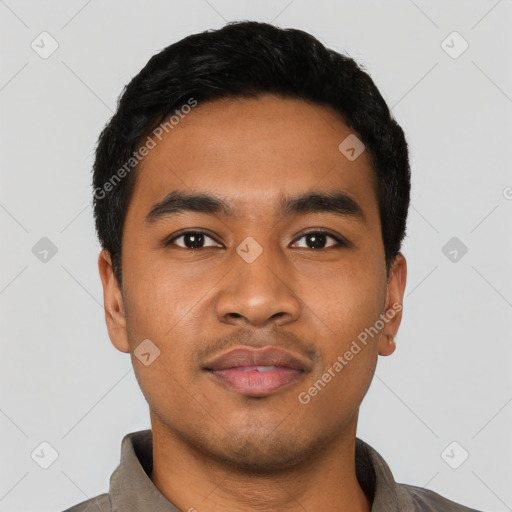 Neutral latino young-adult male with short  black hair and brown eyes