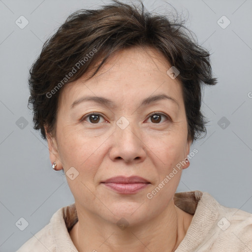 Joyful white adult female with short  brown hair and brown eyes