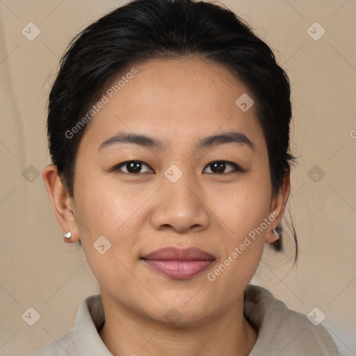 Joyful asian young-adult female with medium  brown hair and brown eyes