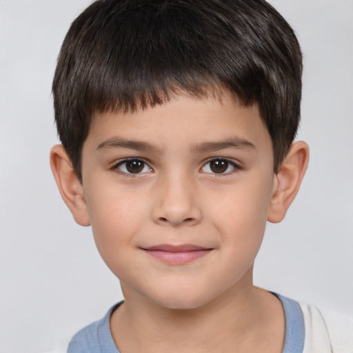 Joyful white child male with short  brown hair and brown eyes