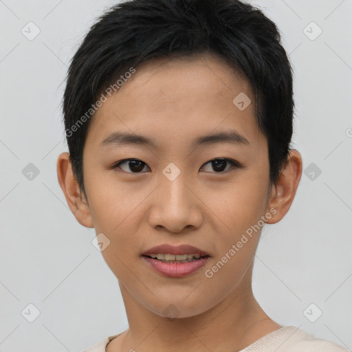 Joyful asian young-adult female with short  black hair and brown eyes