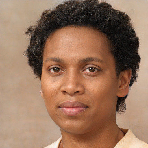 Neutral black young-adult female with short  brown hair and brown eyes