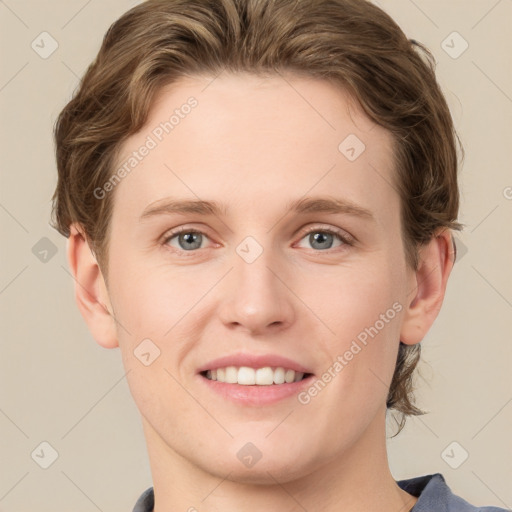 Joyful white young-adult female with short  brown hair and grey eyes