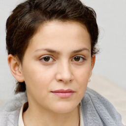 Neutral white young-adult female with short  brown hair and brown eyes