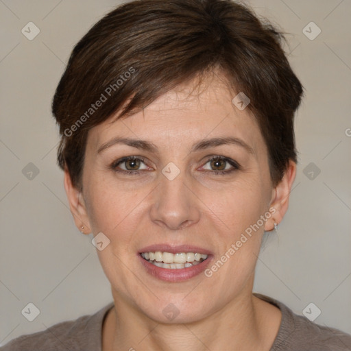 Joyful white adult female with short  brown hair and brown eyes