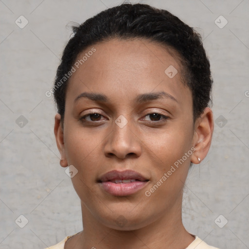 Joyful black young-adult female with short  brown hair and brown eyes