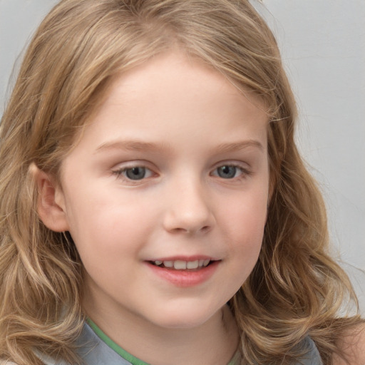 Joyful white child female with long  brown hair and grey eyes