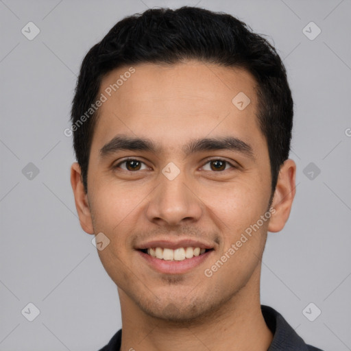 Joyful white young-adult male with short  black hair and brown eyes