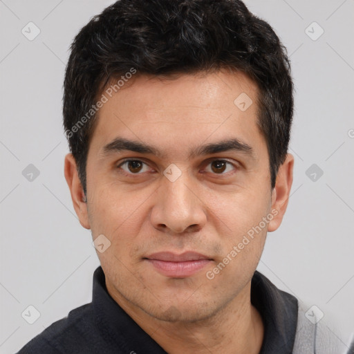 Joyful white adult male with short  black hair and brown eyes