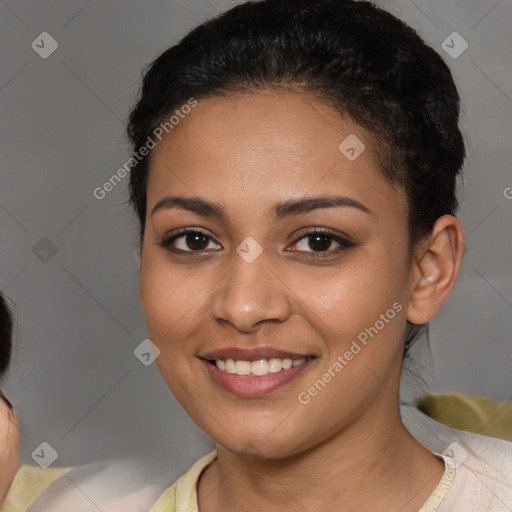 Joyful latino young-adult female with short  brown hair and brown eyes