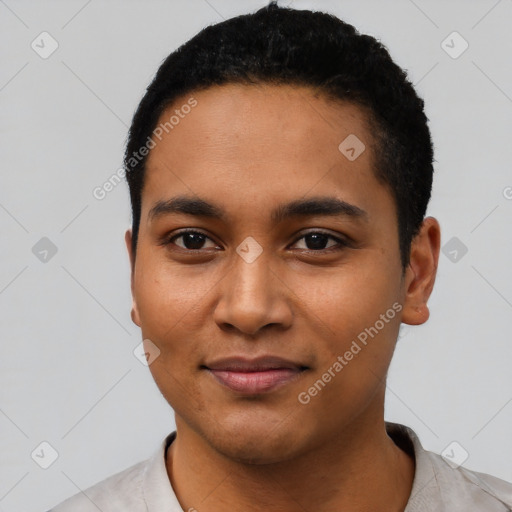 Joyful latino young-adult male with short  black hair and brown eyes