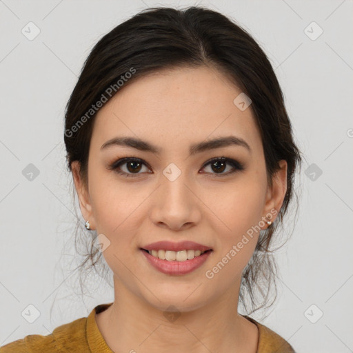 Joyful latino young-adult female with medium  brown hair and brown eyes