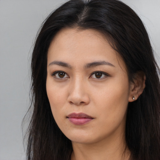 Neutral asian young-adult female with long  brown hair and brown eyes