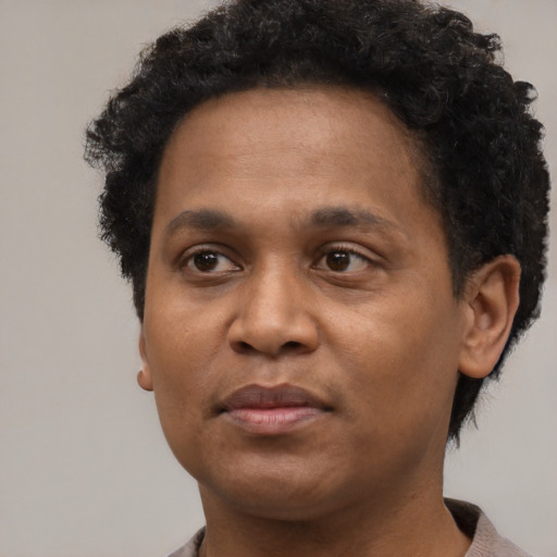 Neutral black young-adult male with short  brown hair and brown eyes