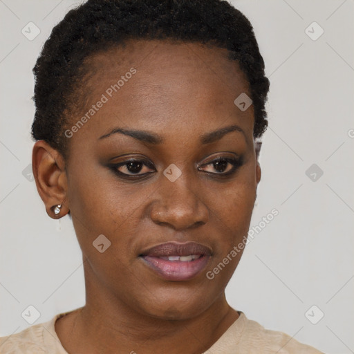 Joyful black young-adult female with short  brown hair and brown eyes