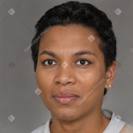 Joyful black young-adult female with short  black hair and brown eyes