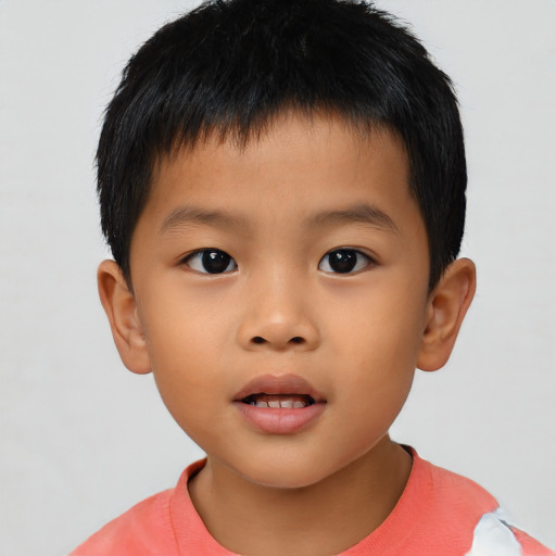 Neutral asian child male with short  brown hair and brown eyes