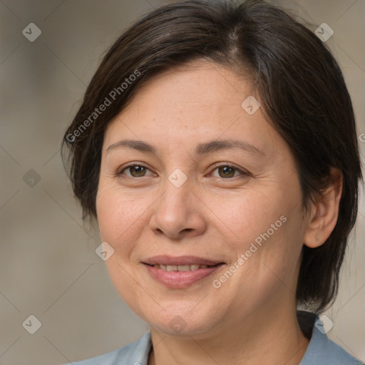 Joyful white adult female with medium  brown hair and brown eyes