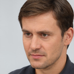 Neutral white adult male with short  brown hair and brown eyes