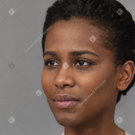 Neutral black young-adult female with short  black hair and brown eyes