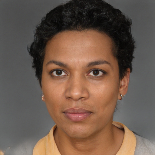 Neutral black young-adult female with short  brown hair and brown eyes